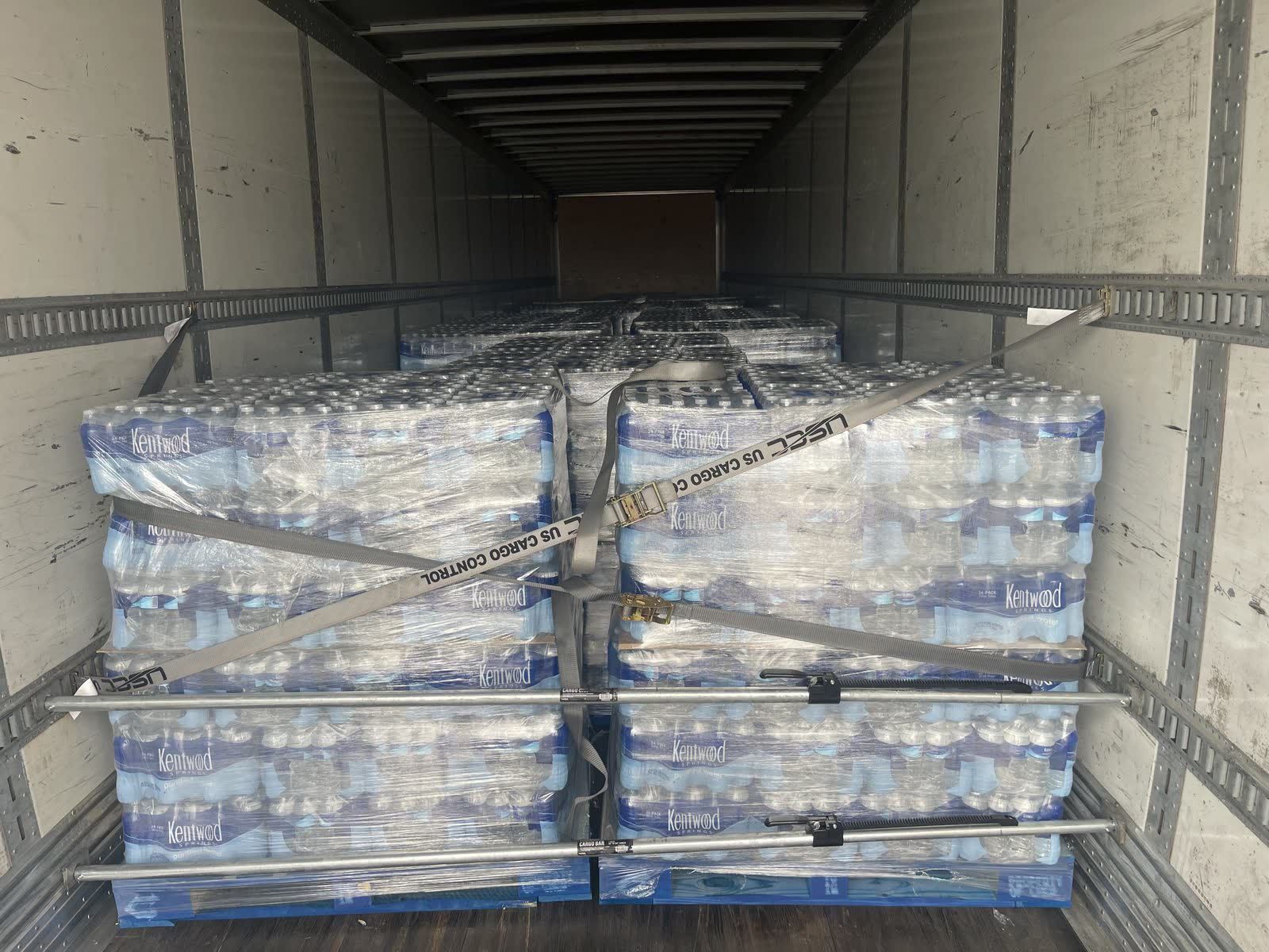 Palletized freight strapped inside a dry van