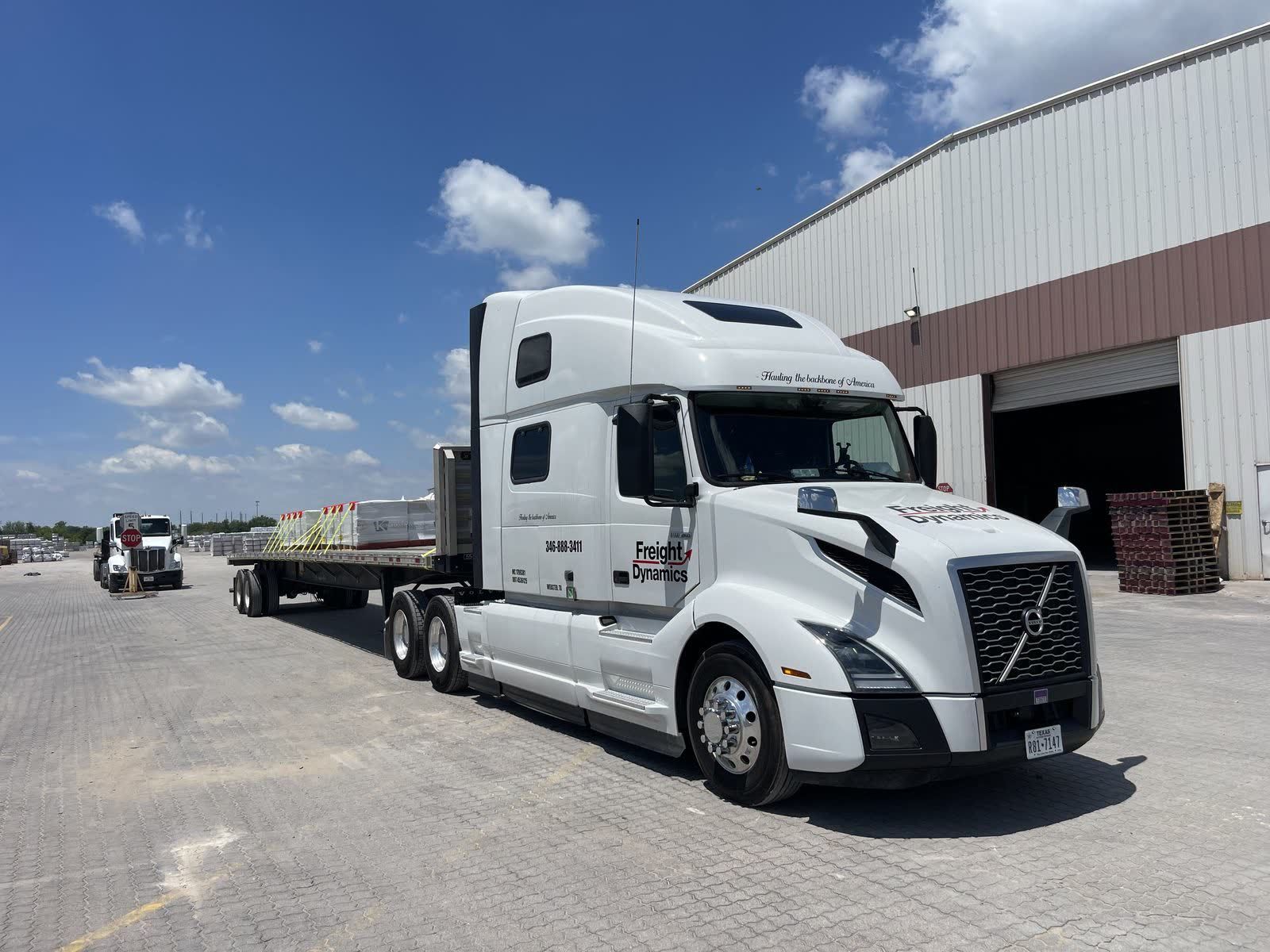 Trailer staged at a warehouse dock for loading
